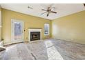 Living room with fireplace and access to backyard at 4160 Alveston Dr, Atlanta, GA 30349