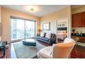 Living room with hardwood floors and city view at 361 17Th St # 2001, Atlanta, GA 30363