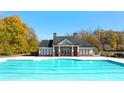 Community lap pool with adjacent pool house at 13556 Whitman Lane, Covington, GA 30014