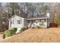 Ranch house with attached garage and front porch at 4025 Casa Verde Dr, Atlanta, GA 30349