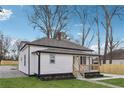 Newly renovated home with a grassy yard and a walkway at 1617 Church Ne St, Conyers, GA 30012