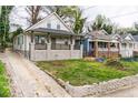 Newly renovated craftsman home with driveway and landscaped lawn at 966 Ashby Grove Sw Grv, Atlanta, GA 30314