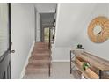 Bright entryway with stairs and a console table at 3301 Henderson Mill Rd # A2, Atlanta, GA 30341