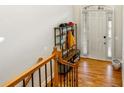 Spacious foyer with hardwood floors, coat rack, and view of staircase at 2983 Rivergreen Ln, Atlanta, GA 30339