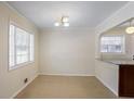 Small dining area with tile floors and access to the kitchen at 3343 Charlemagne Dr, Decatur, GA 30034