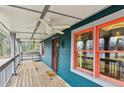 Spacious front porch featuring a ceiling fan and wooden flooring at 106 Hillside Se Ave, Atlanta, GA 30315