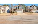Two story house in a neighborhood setting with other similar homes nearby at 161 Parkview Place Dr, Mcdonough, GA 30253