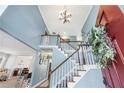 Two-story foyer with elegant staircase and neutral wall colors at 275 Trowbridge Ln, Lawrenceville, GA 30043