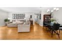 Bright living room features hardwood floors, a neutral color palette, and ample natural light at 2732 Suwanee Se Way, Marietta, GA 30067