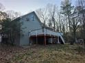 Spacious deck overlooking a wooded backyard at 1821 N Oak Dr, Lawrenceville, GA 30044