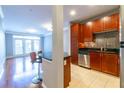 Modern kitchen with stainless steel appliances and breakfast bar at 400 17Th Nw St # 2118, Atlanta, GA 30363