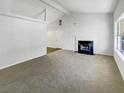 Spacious living room featuring a fireplace and hardwood floors at 2845 Robinson Wood Dr, Riverdale, GA 30296