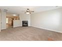 Spacious living room with a fireplace and neutral carpeting at 2858 Vining Ridge Ter, Decatur, GA 30034