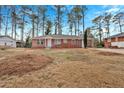 House exterior with driveway and trees at 4223 Welbron Dr, Decatur, GA 30035