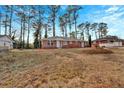 Ranch home with mature trees and yard at 4223 Welbron Dr, Decatur, GA 30035