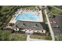 Aerial view of community pool area with lounge chairs, umbrellas, clubhouse, and ample parking at 8587 Seabiscuit Rd, Lithonia, GA 30058