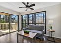Cozy sitting area with large windows offering wooded views at 4676 Vinings Central Se Run # 104, Atlanta, GA 30339