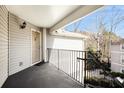 Private entrance to condo with exterior stairs and railing at 4008 Orchard Hill Ter, Stone Mountain, GA 30083