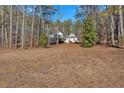 House exterior showcasing large backyard and wooded area at 344 Bells Ferry Ne Rd, White, GA 30184