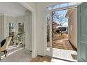 Bright entryway with view of backyard through open door at 3405 Doral Ln, Woodstock, GA 30189