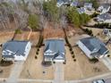 Aerial view of house and surrounding neighborhood at 6285 Vista Crossing Way, Cumming, GA 30028