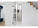 Glass-front wine cellar with modern racking system at 500 Ridgewater Dr, Marietta, GA 30068