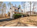 Two-story house with wraparound porch and driveway at 40 Brompton Dr, Dallas, GA 30157