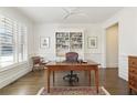 Beautifully appointed office featuring hardwood floors, white trim, and custom built-ins at 11644 Parkside Ave, Alpharetta, GA 30005