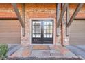 Elegant double front doors with sidelights, leading to the townhome at 235 Founders Mill Ct, Roswell, GA 30075