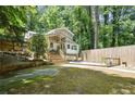 Spacious backyard with a deck and wooded area at 2038 Clairmont Ne Ter, Atlanta, GA 30345