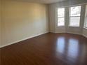 Spacious living room featuring hardwood floors and large windows at 4551 Jackybell Trl, Decatur, GA 30034