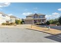 Two-story house with a two-car garage, basketball goal, and fire hydrant at 5615 Cowles Cir, Suwanee, GA 30024