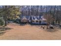 Ranch style brick home with a large front yard at 95 Twin Lakes Dr, Carrollton, GA 30116