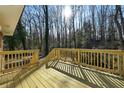 Wooden deck overlooking a private wooded backyard at 6467 Joanna St, Lithia Springs, GA 30122