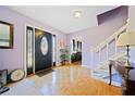 Spacious entry with hardwood floors and staircase at 1956 Spencer Oaks Ln, Lithonia, GA 30058