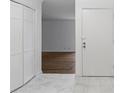 Bright entryway with white doors and marble-style flooring at 3242 Henderson Mill Rd # 3, Atlanta, GA 30341