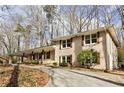 Brick house with a long driveway and wood accents at 2481 Brookdale Dr, Atlanta, GA 30345