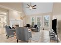 Spacious living room with fireplace and hardwood floors at 3210 Garmon Oak Trl, Lawrenceville, GA 30044