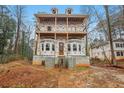 Exterior view of a house featuring balconies and wooden frame at 3160 Hathaway Ct, Atlanta, GA 30341