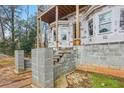 Unfinished exterior of the house showing the foundation and steps at 3160 Hathaway Ct, Atlanta, GA 30341