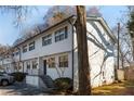 Side view of a two-story white brick building with landscaping at 1687 Briarcliff Ne Rd # 8, Atlanta, GA 30306