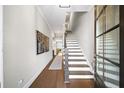 Bright and spacious entryway with hardwood floors and a staircase at 613 Stone Field Nw Run, Marietta, GA 30060