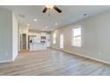 Open floor plan with kitchen island and stainless steel appliances at 17 Camellia Dr, Fairburn, GA 30213