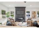 Spacious living room with fireplace and hardwood floors at 1732 Beecher Nw St, Atlanta, GA 30310