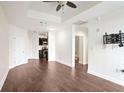 Hardwood floor living room, open concept kitchen and bathroom access at 325 E Paces Ferry Ne Rd # 2104, Atlanta, GA 30305