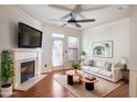 Spacious living room with fireplace and hardwood floors at 887 Commonwealth Se Ave, Atlanta, GA 30312