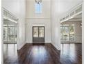 Bright entryway with hardwood floors and views to other rooms at 1078 Meadow Brook Dr, Woodstock, GA 30188