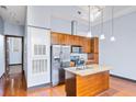 Modern kitchen features stainless steel appliances and granite countertops at 1195 Milton Se Ter # 2305, Atlanta, GA 30315