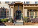 Impressive entryway with double doors and classic columns at 1696 Windsor Ne Pkwy, Atlanta, GA 30319