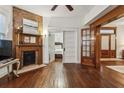 Spacious living room with hardwood floors, fireplace, and built-ins at 407 Bass Se St, Atlanta, GA 30315